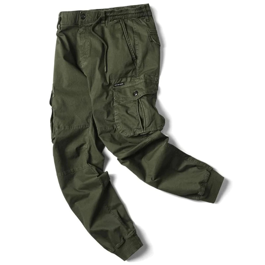 https://cdn.shopify.com/s/files/1/0878/4406/1529/files/VANGUARD-Langecargobroekvoorheren_5a11c76e-c2ad-4997-9ebb-fcff6820c9d8.jpg?v=1772202271