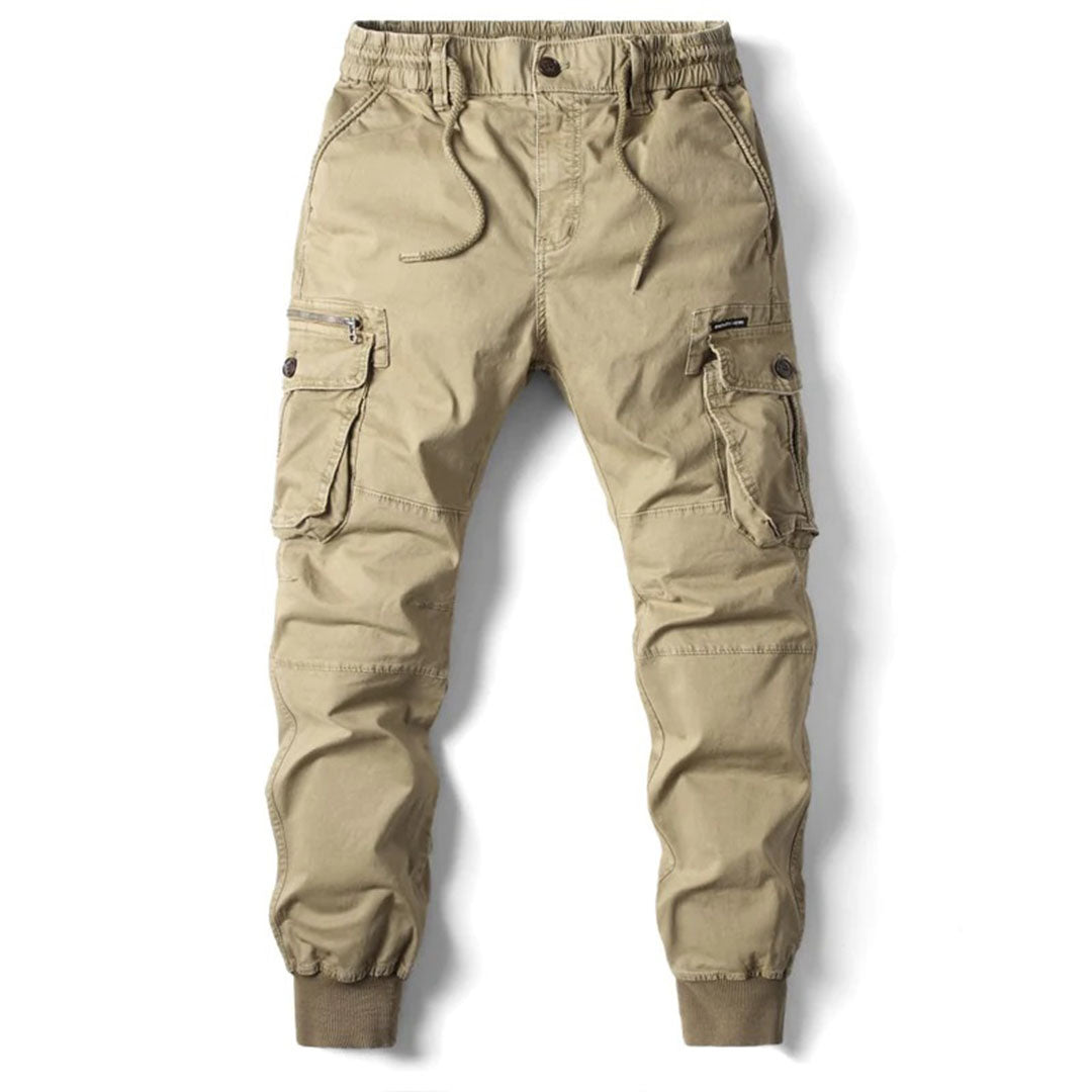https://cdn.shopify.com/s/files/1/0878/4406/1529/files/VANGUARD-Langecargobroekvoorheren_74361f7b-ca6e-485a-9909-65f972bf8e2b.jpg?v=1772202271