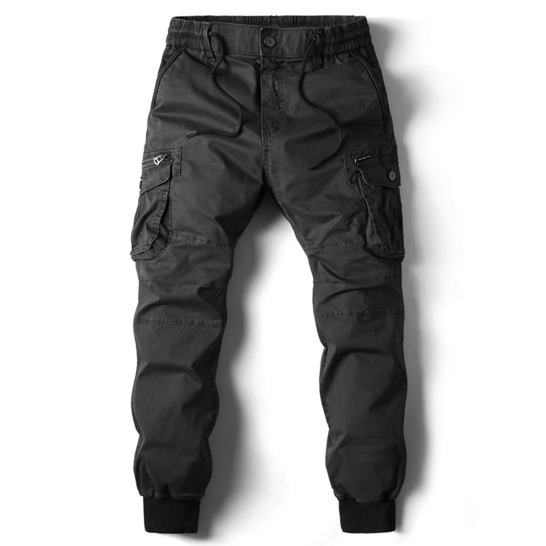 https://cdn.shopify.com/s/files/1/0878/4406/1529/files/VANGUARD-Langecargobroekvoorheren_f41005fe-d1e2-4381-be84-a061b7705580.jpg?v=1772202271