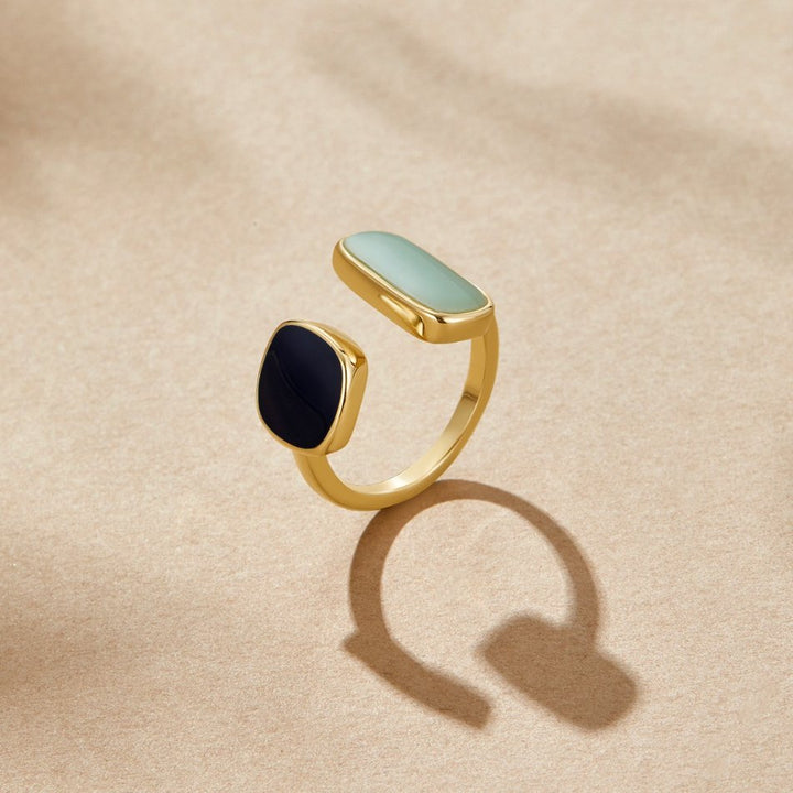 Elegant silver wrap ring with subtle shadow details