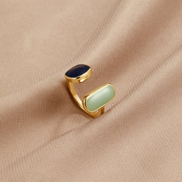Elegant silver wrap ring with subtle shadow details