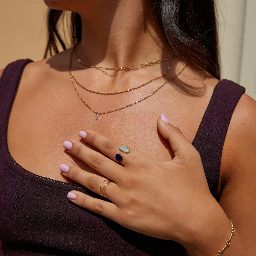 Elegant silver wrap ring with subtle shadow details