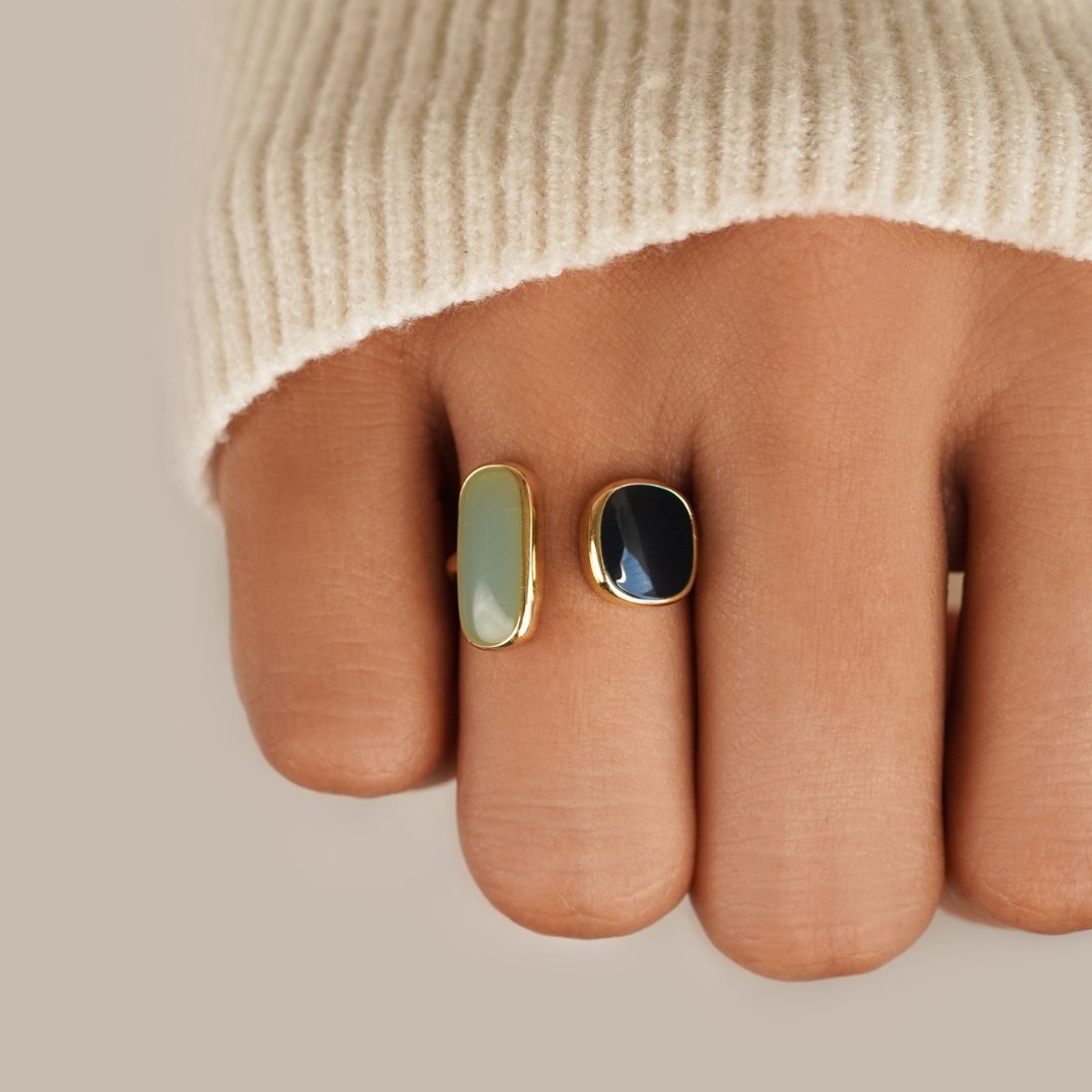 Elegant silver wrap ring with subtle shadow details