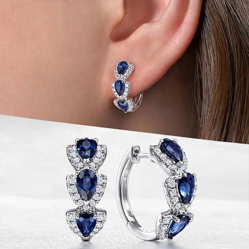 Elegant white gold earrings with sapphire accents