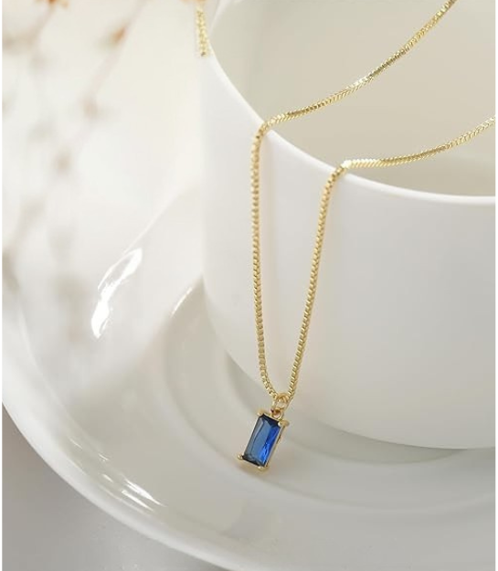 Elegant white gold necklace with sapphire pendant