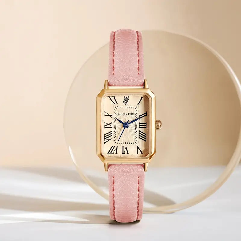 Elegant gold watch with a refined little stone