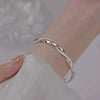Braided Silver Bracelet – Elegant, Adjustable Design