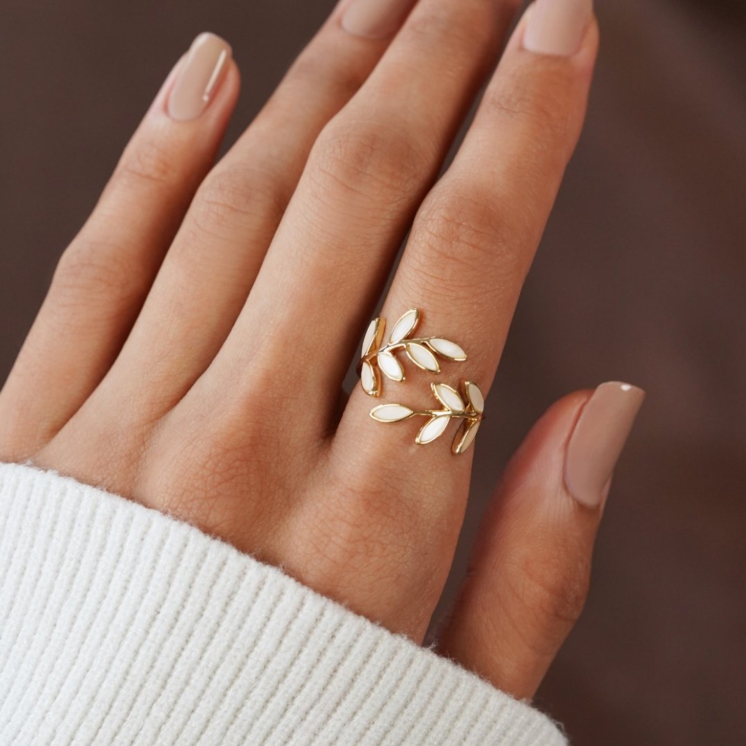 Serene gold ring with delicate little leaves