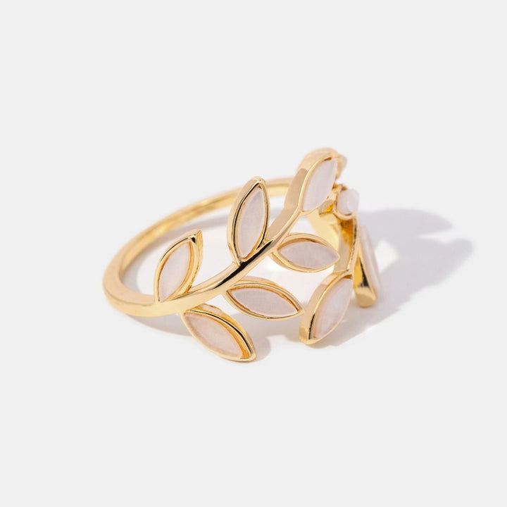 Serene gold ring with delicate little leaves