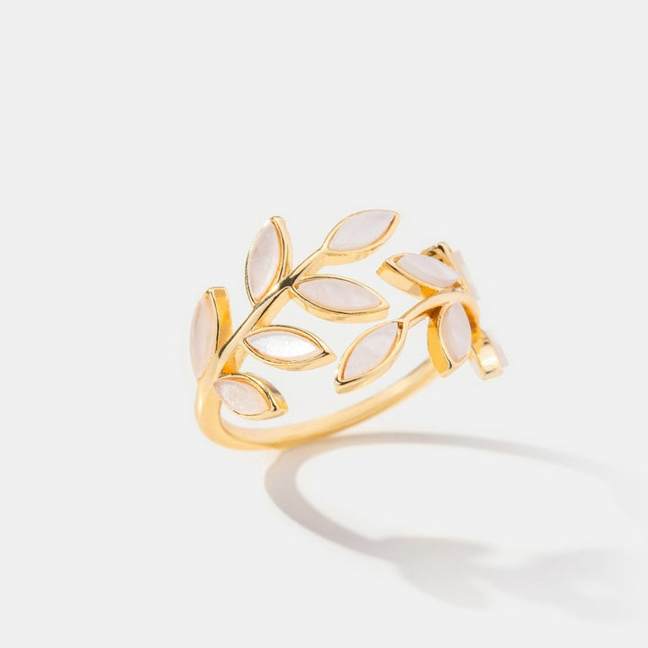 Serene gold ring with delicate little leaves