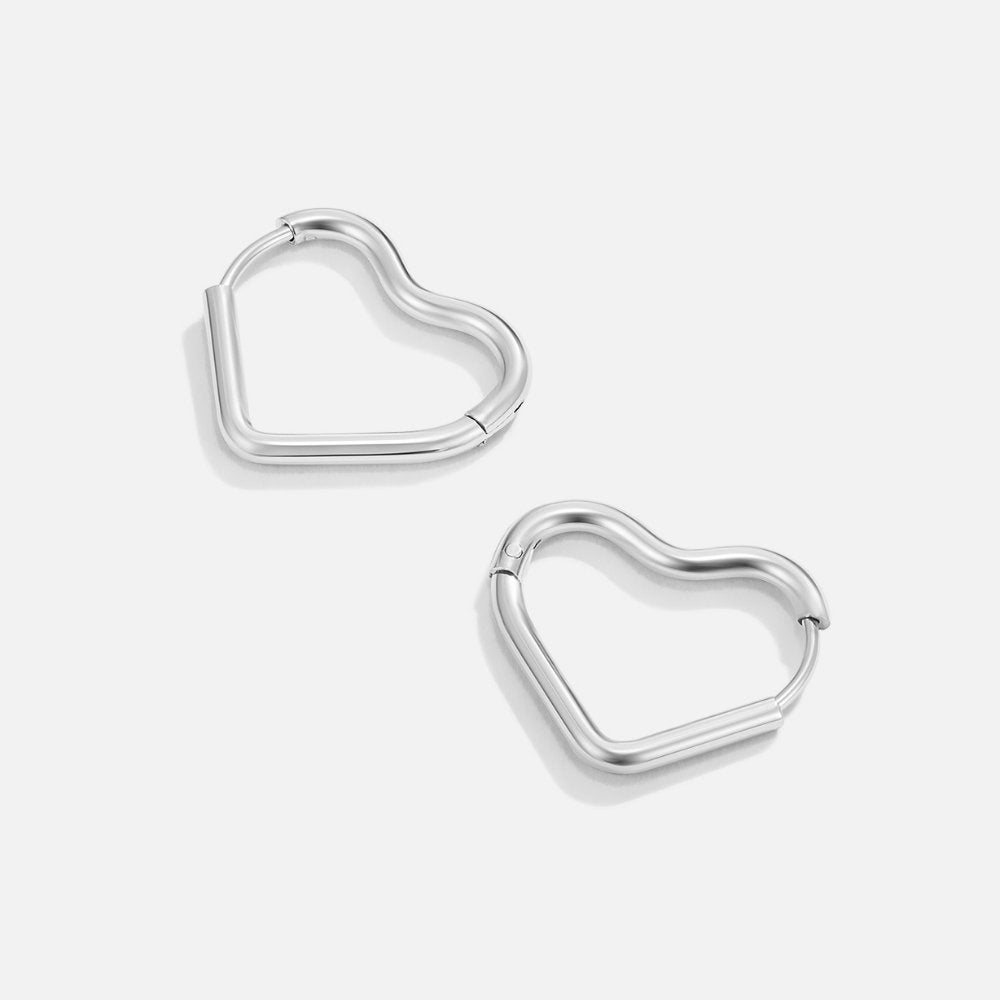 Elegant silver earrings with heart-shaped details