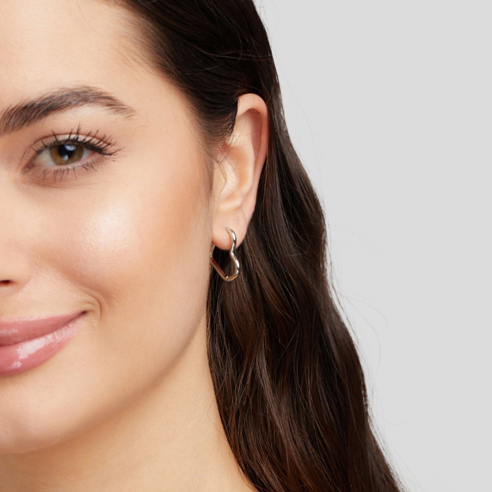 Elegant silver earrings with heart-shaped details