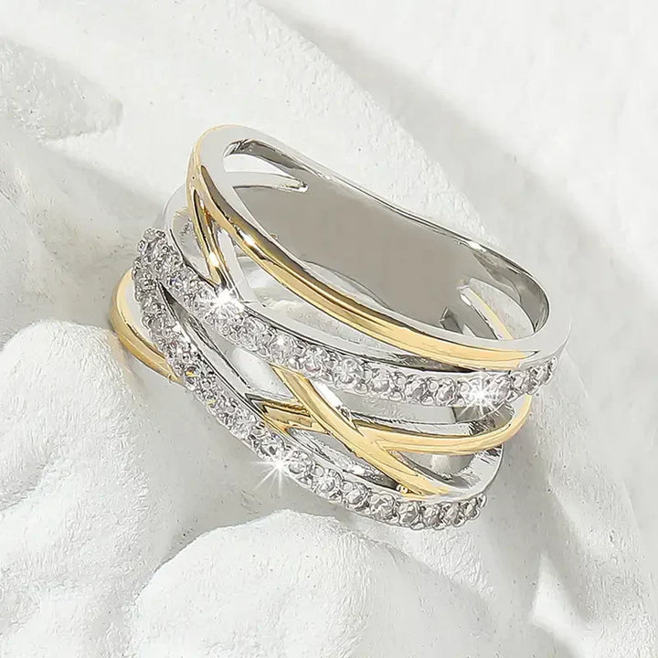 Radiant cubic zirconia ring in mixed gold