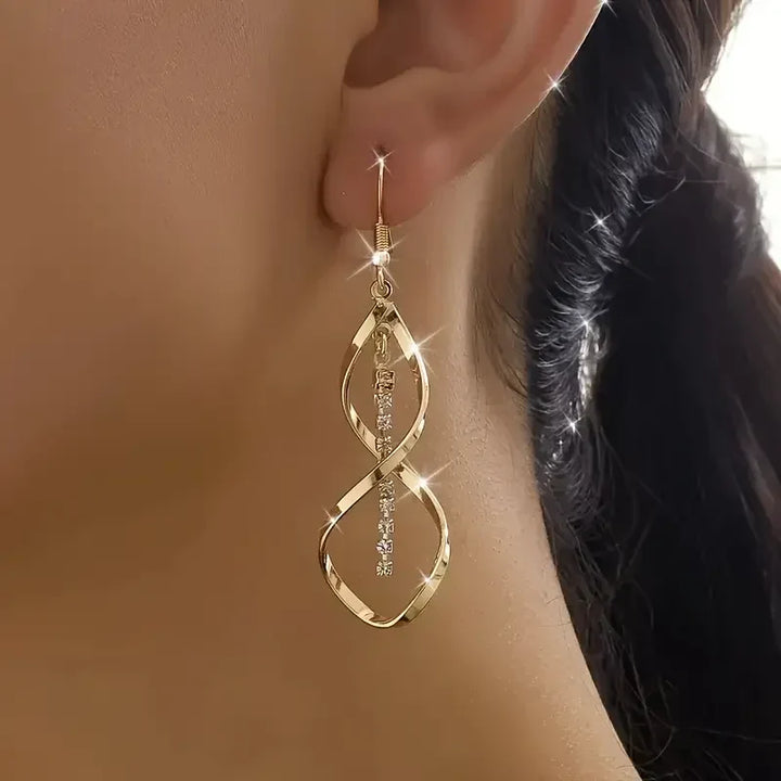 Spiral gold earrings with an elegant design