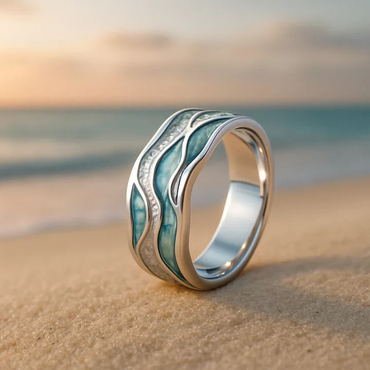 Silver ring with wave design and turquoise accents