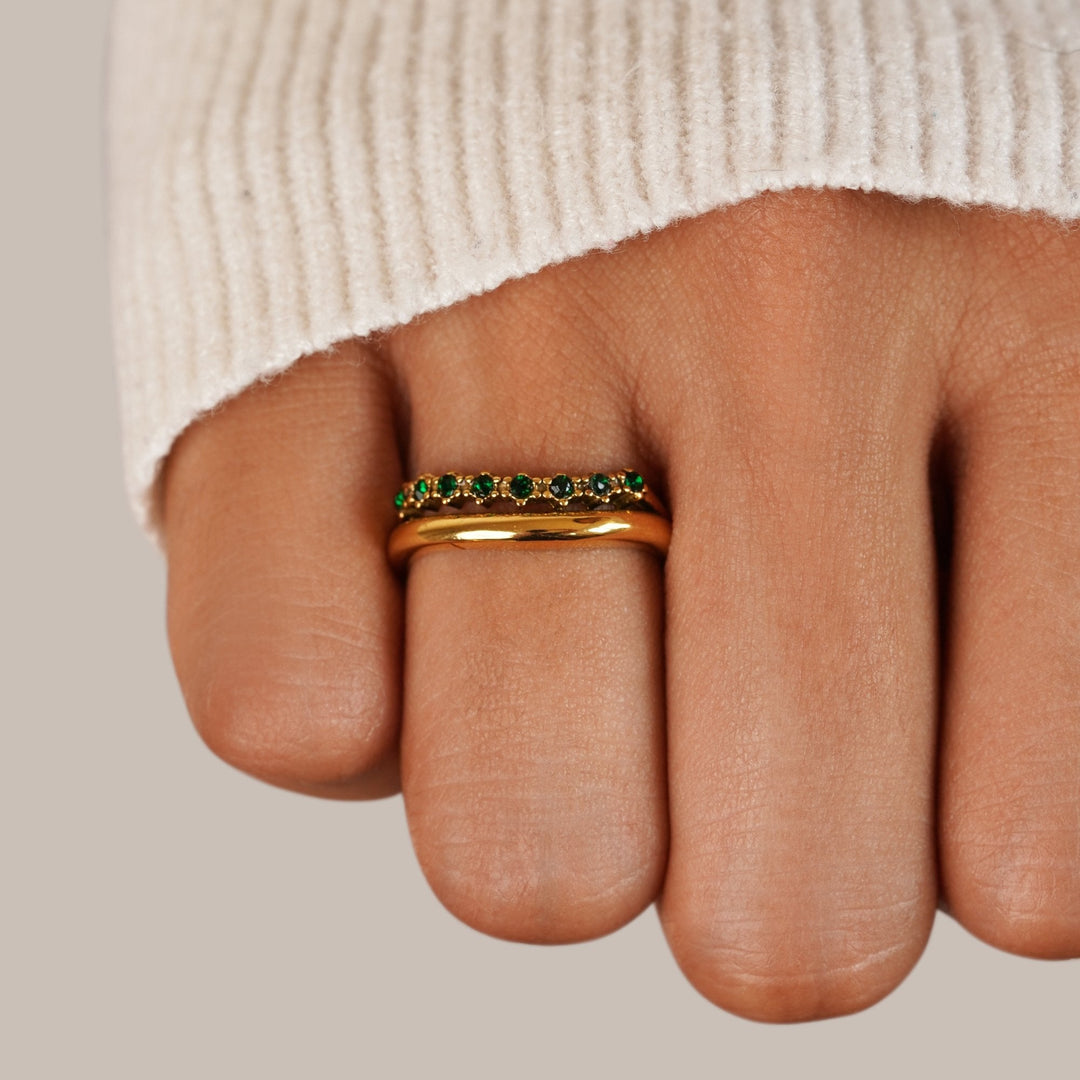 Elegant emerald-green ring with refined layers