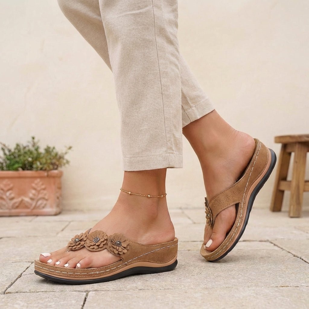 https://cdn.shopify.com/s/files/1/0878/4406/1529/files/orthopedic-flip-flops-floral-wedge-heel-comfort-sandals-2.jpg?v=1777503896