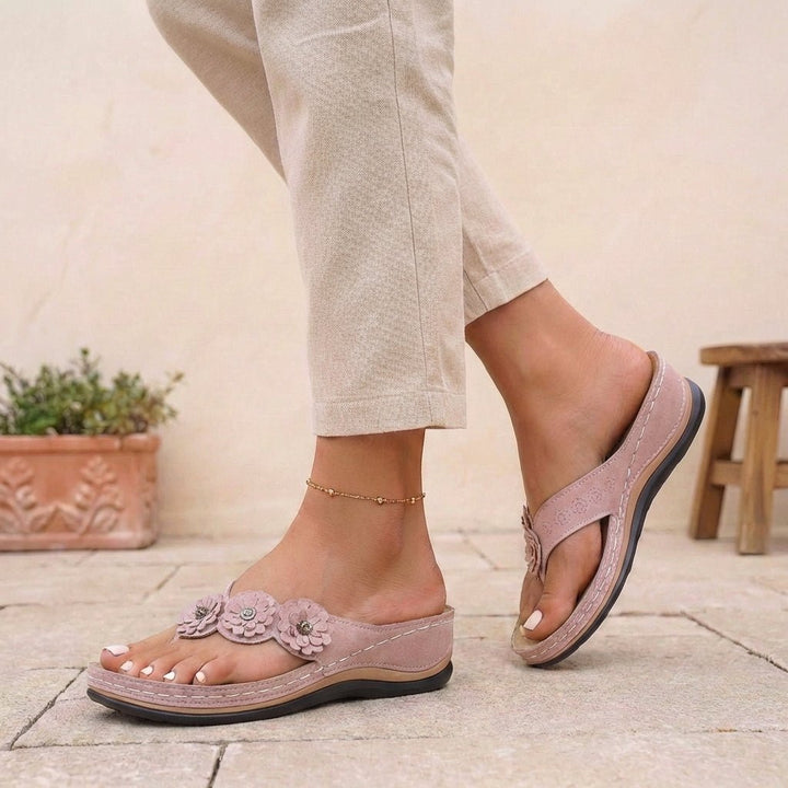 https://cdn.shopify.com/s/files/1/0878/4406/1529/files/orthopedic-flip-flops-floral-wedge-heel-comfort-sandals-5.jpg?v=1777503896