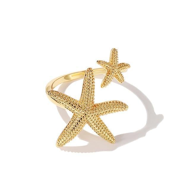 Elegant starfish ring in silver with gold accents