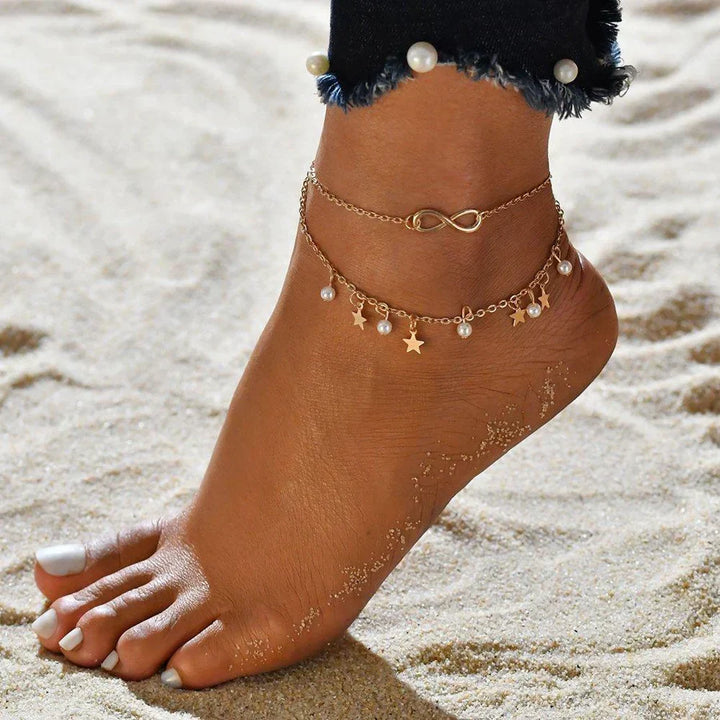 Endless white gold anklet with pearls and stars