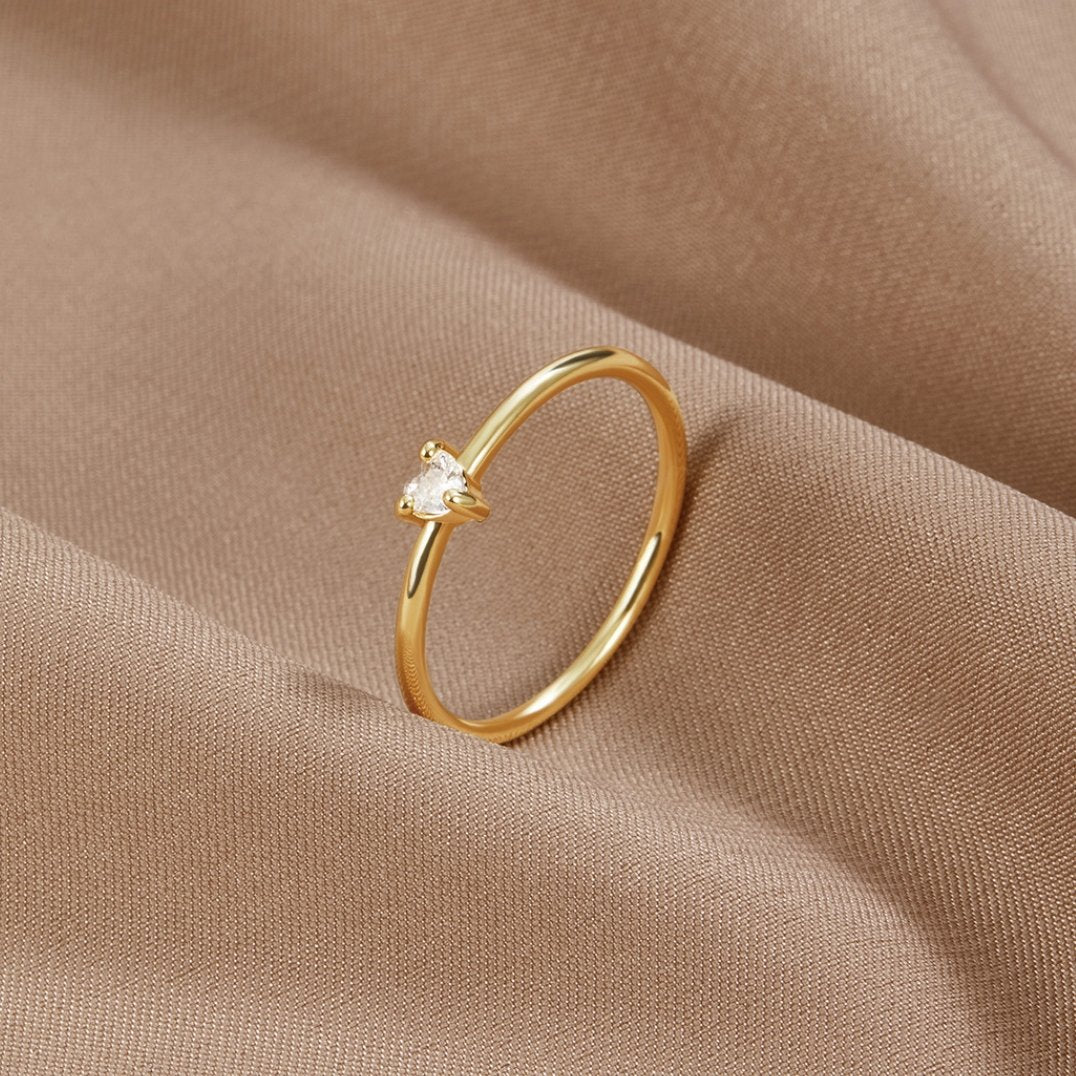 Refined cubic zirconia ring with little heart