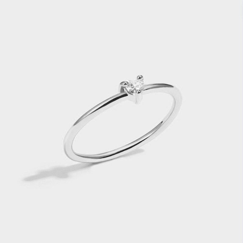 Refined cubic zirconia ring with little heart
