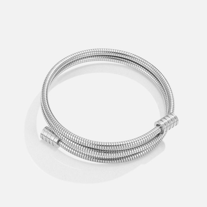 Refined silver bracelet with a subtle twist