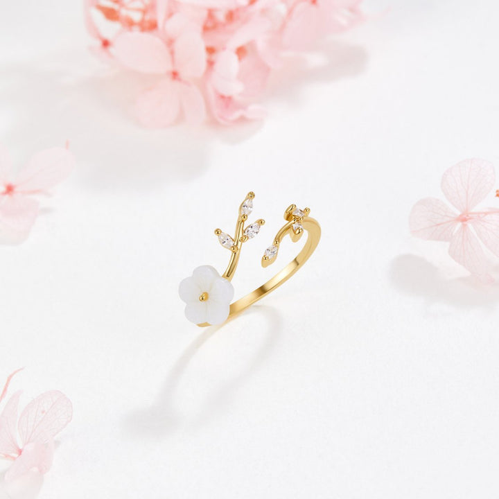Soft white cubic zirconia flower ring